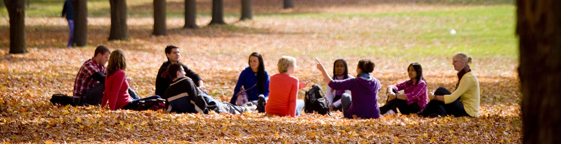 A group of students in the autumn on Johnston Green