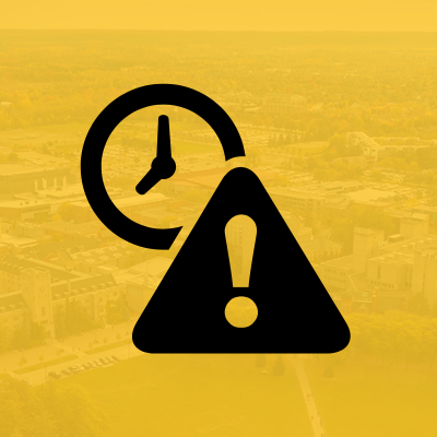 black clock and caution icon on a yellow background