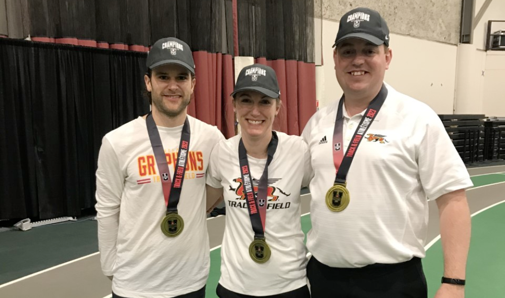Health and Performance Centre Dr. Robert Winslow and Dr. Kate Henderson wearing Gold Medals at the 2023 USPORTS Track & Field National Championships